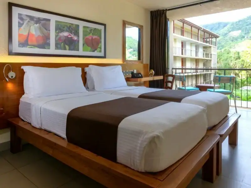 صورة: Coral Strand Smart Choice Hotel: Standard  Signature Garden  & Mountain View